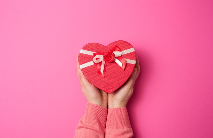 Hands_Holding_A_Red_Box_original_1079804-scaled